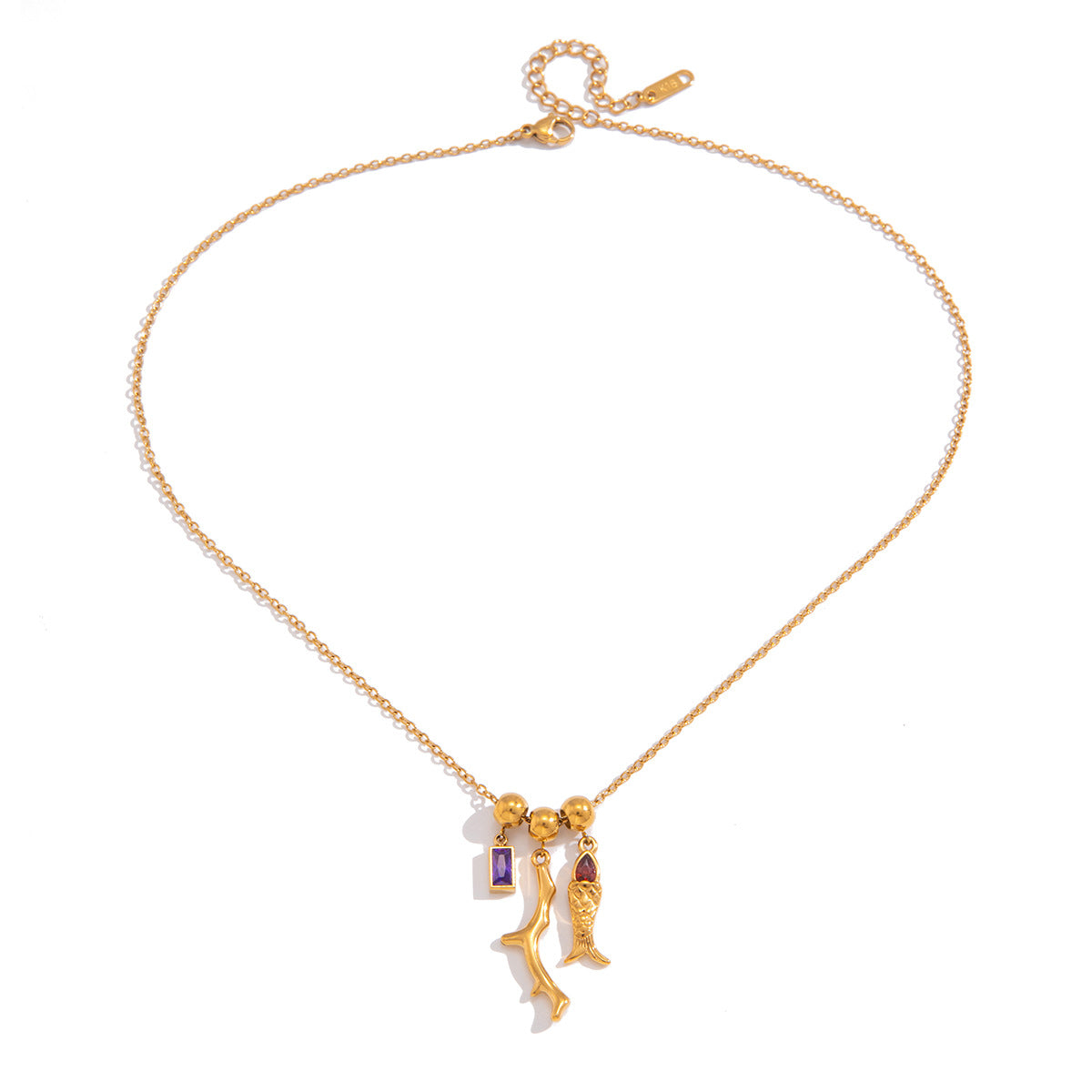 Gold necklace with charms on a white background