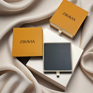 Ziravia makeup compact and case on a soft fabric background