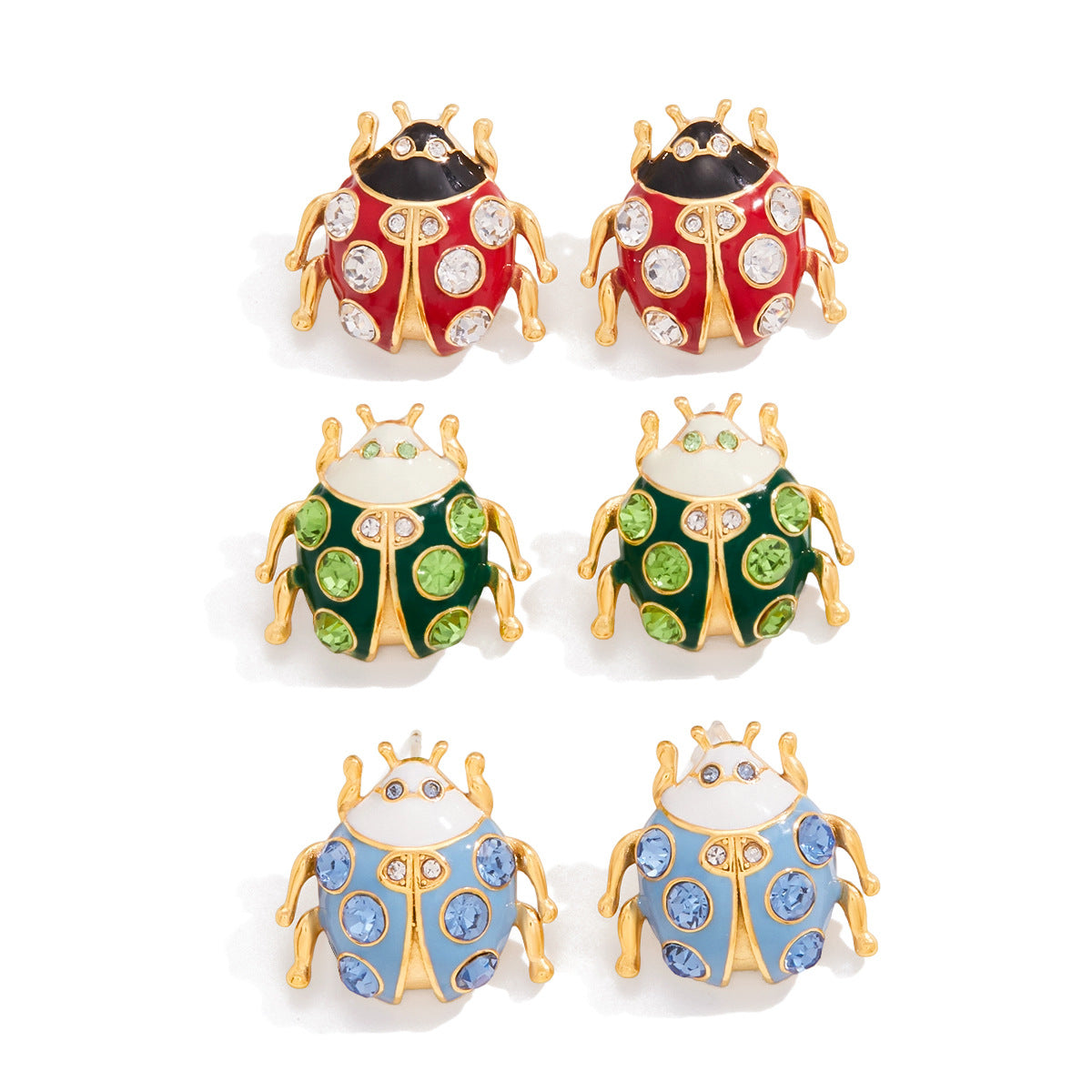 Set of six colorful ladybug-shaped jewelry boxes on a white background