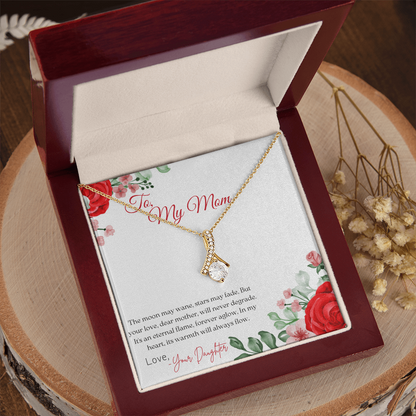 Alluring Beauty gold Necklace in a Luxury Box with a wooden textured background
