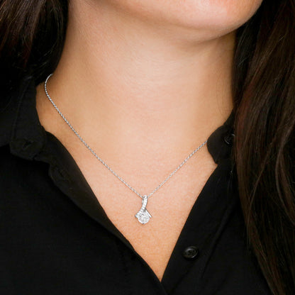 picture of a woman s upper abdomen where an alluring beauty necklace is shown