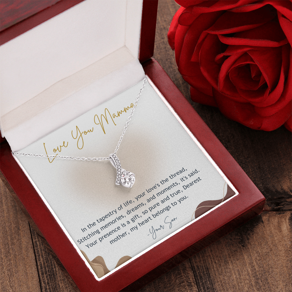 Alluring Beauty necklace with gift card in luxury box with a red rose in a side with a wooden background 