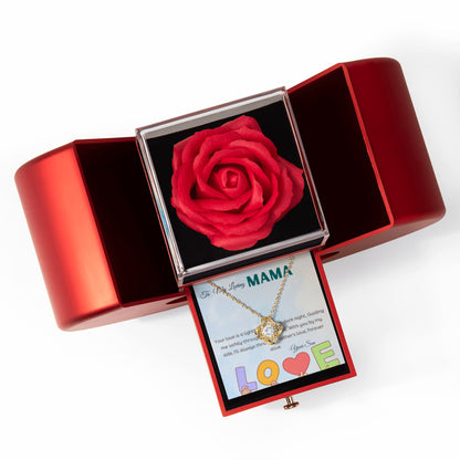 Love knot gold color necklace in a heart shaped rose gift box with a message card in a white background