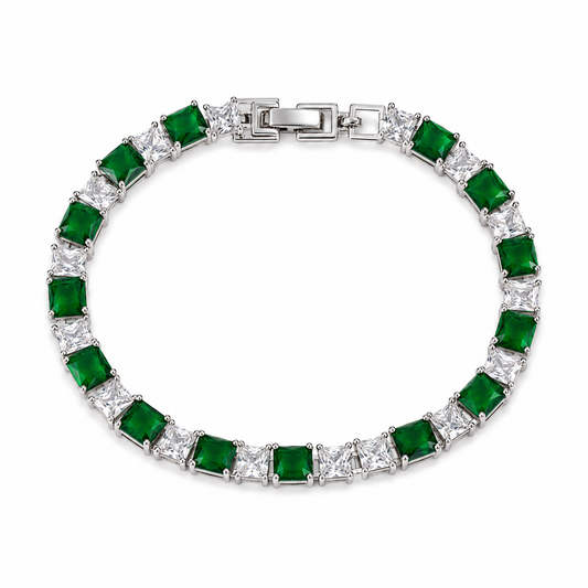 Bracelet with green gemstones and a silver clasp on a white background