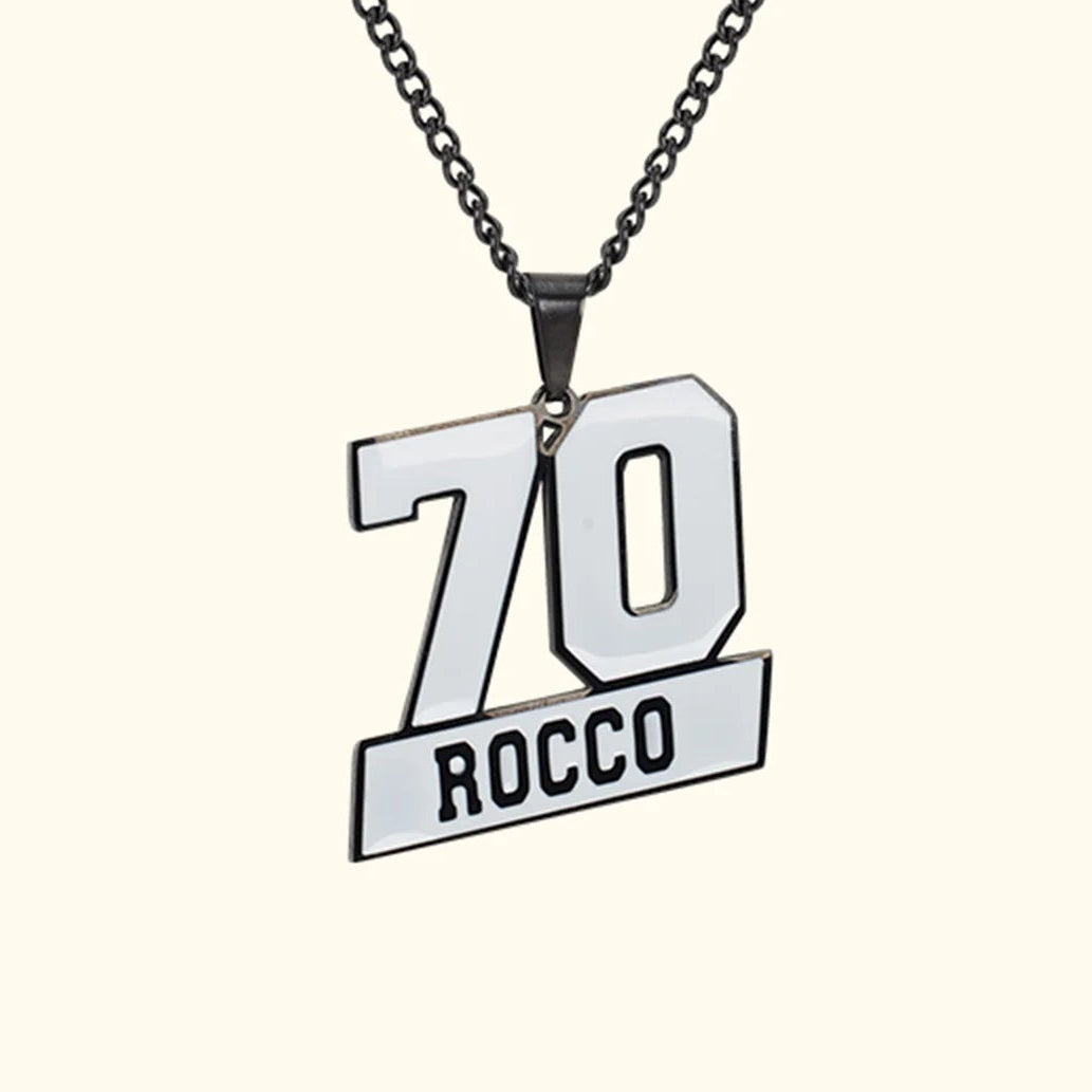 Necklace with a pendant featuring '70 Rocco' on a white background