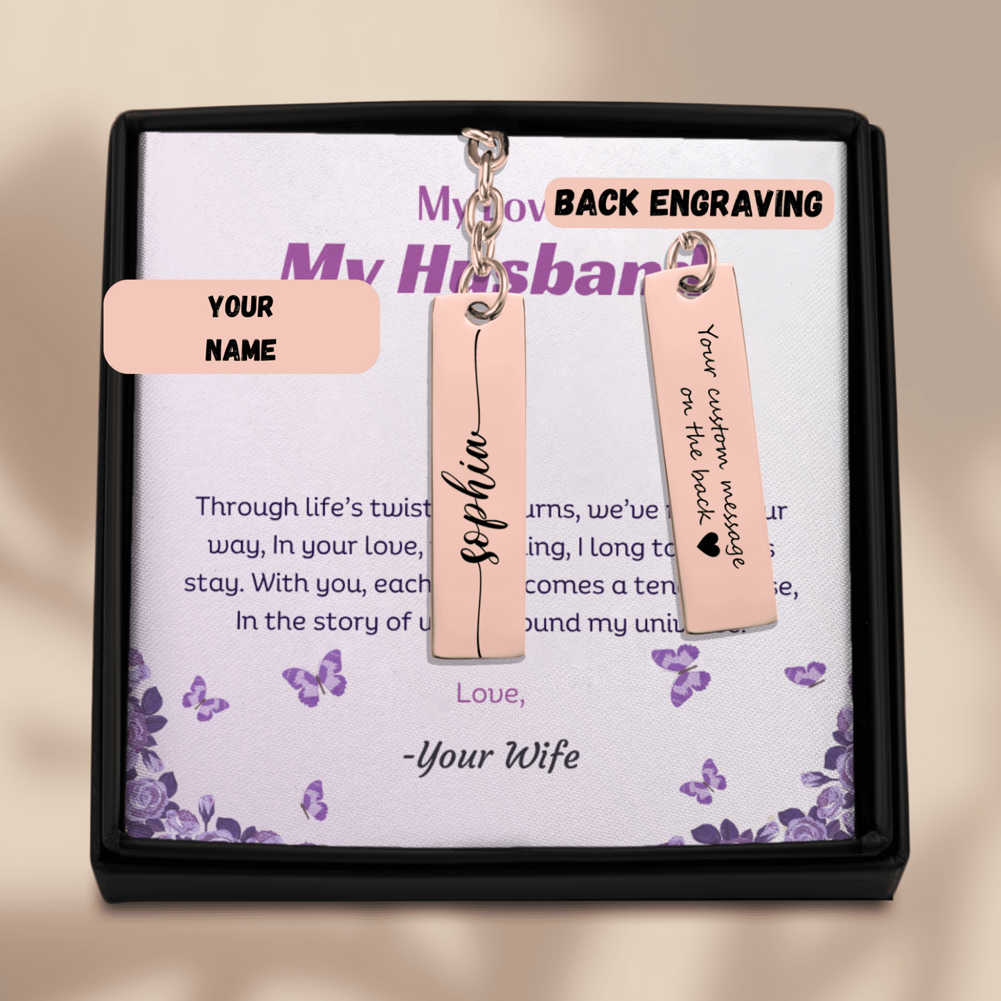 Personalized keychains with customizable back engraving in a decorative box.