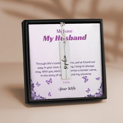 Personalized necklace with a tag in a decorative box, featuring a message for 'My Husband'.
