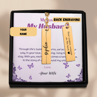 Gold bar earrings with engraving options in a decorative box