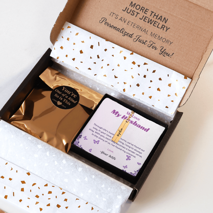Jewelry box with a personalized message card and gold packaging