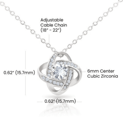 Silver necklace with a cubic zirconia pendant, showing measurements on a white background.