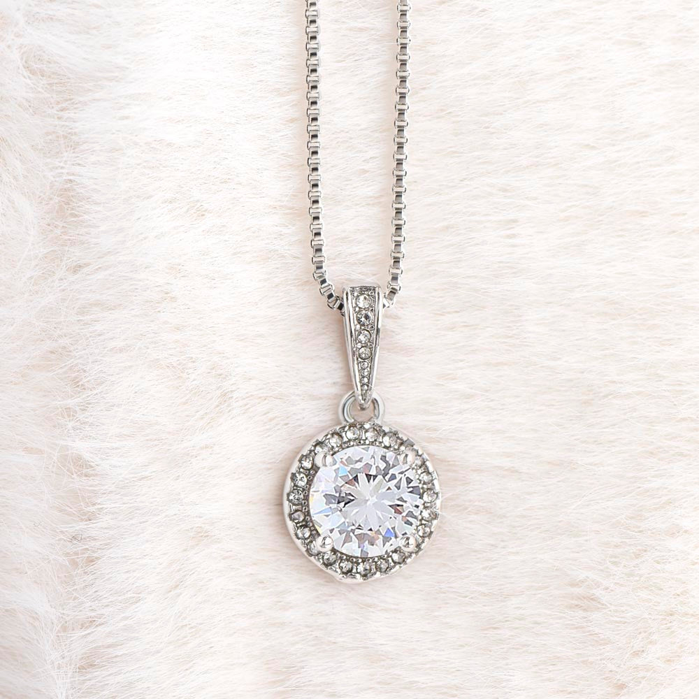 Shiny Eternal hope necklace in a cotton background 