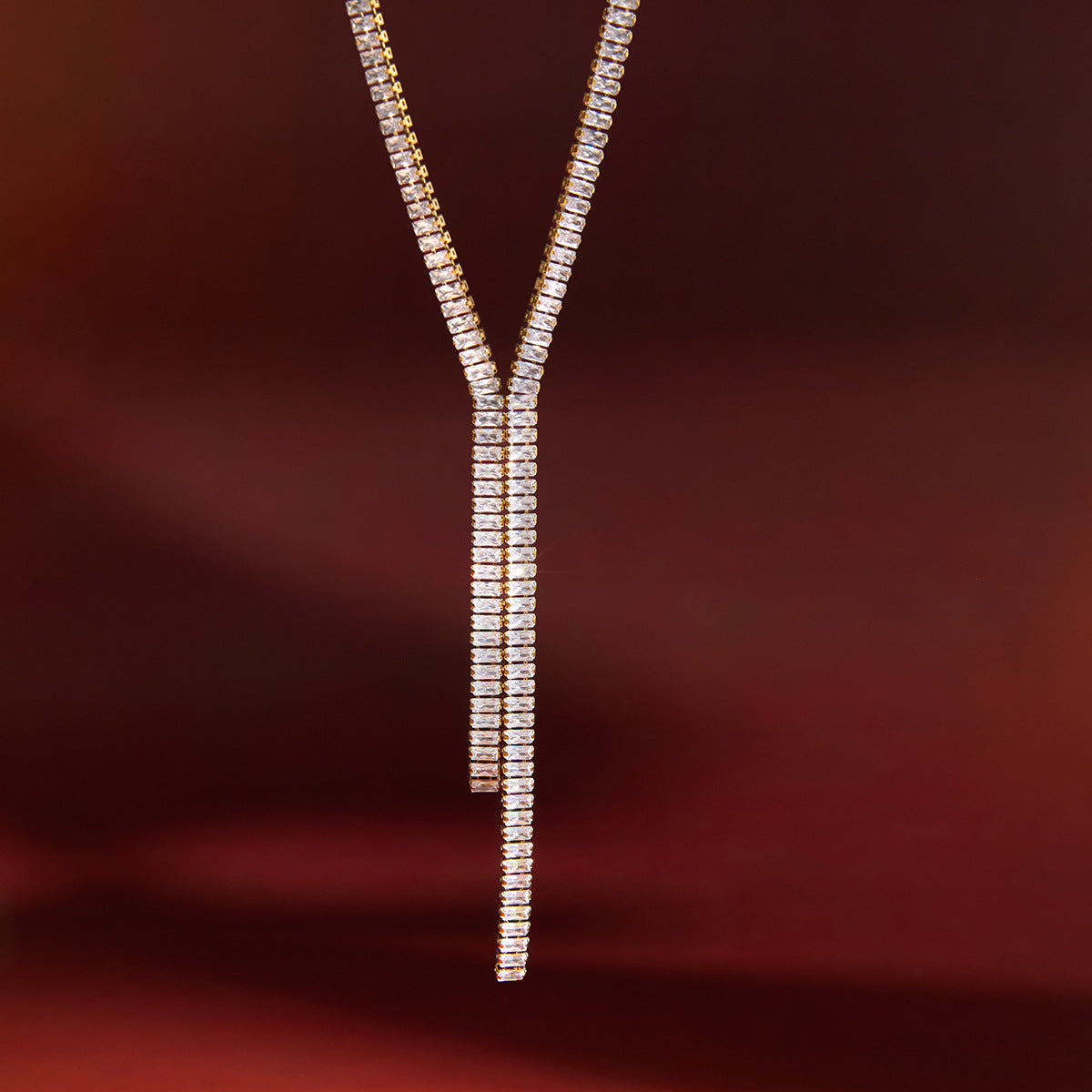 Diamond necklace on a red fabric background