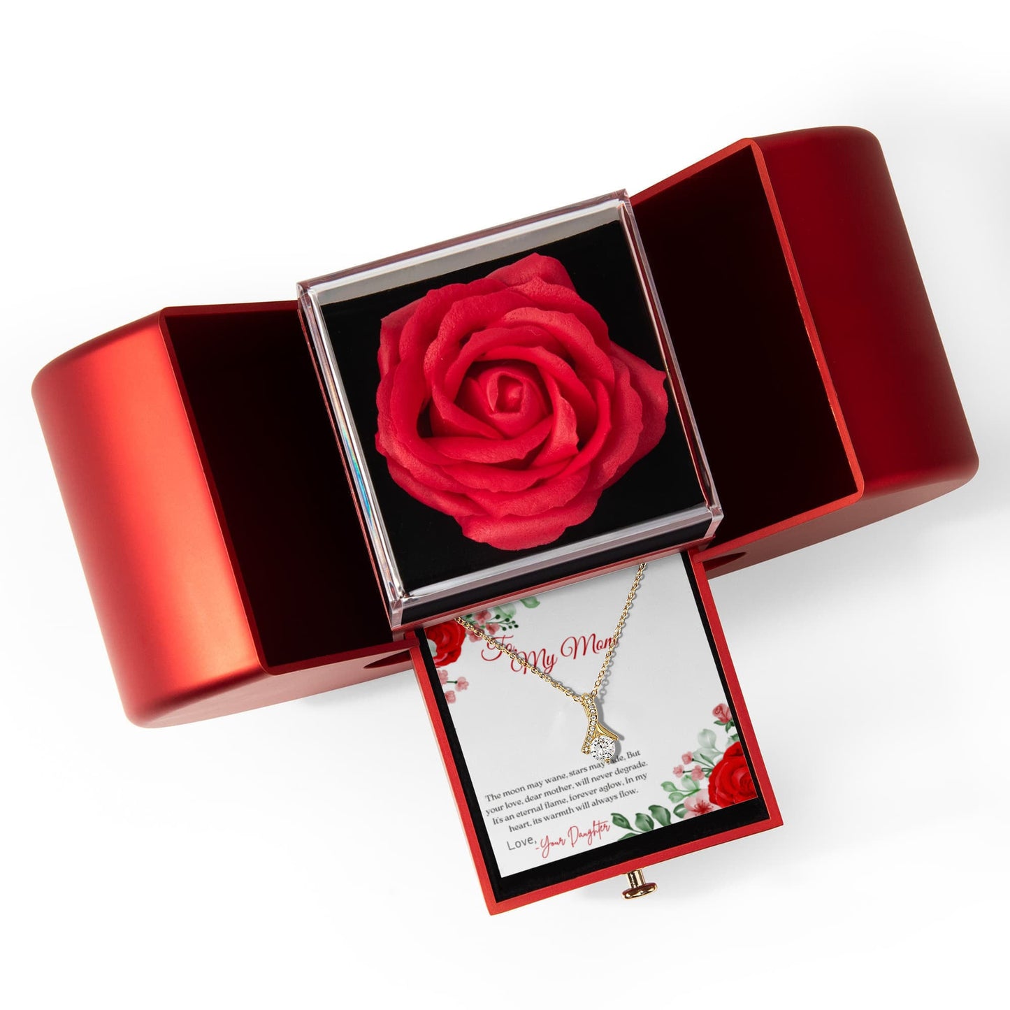 Red rose in a  heart shaped red box with a card and necklace inside on a white background