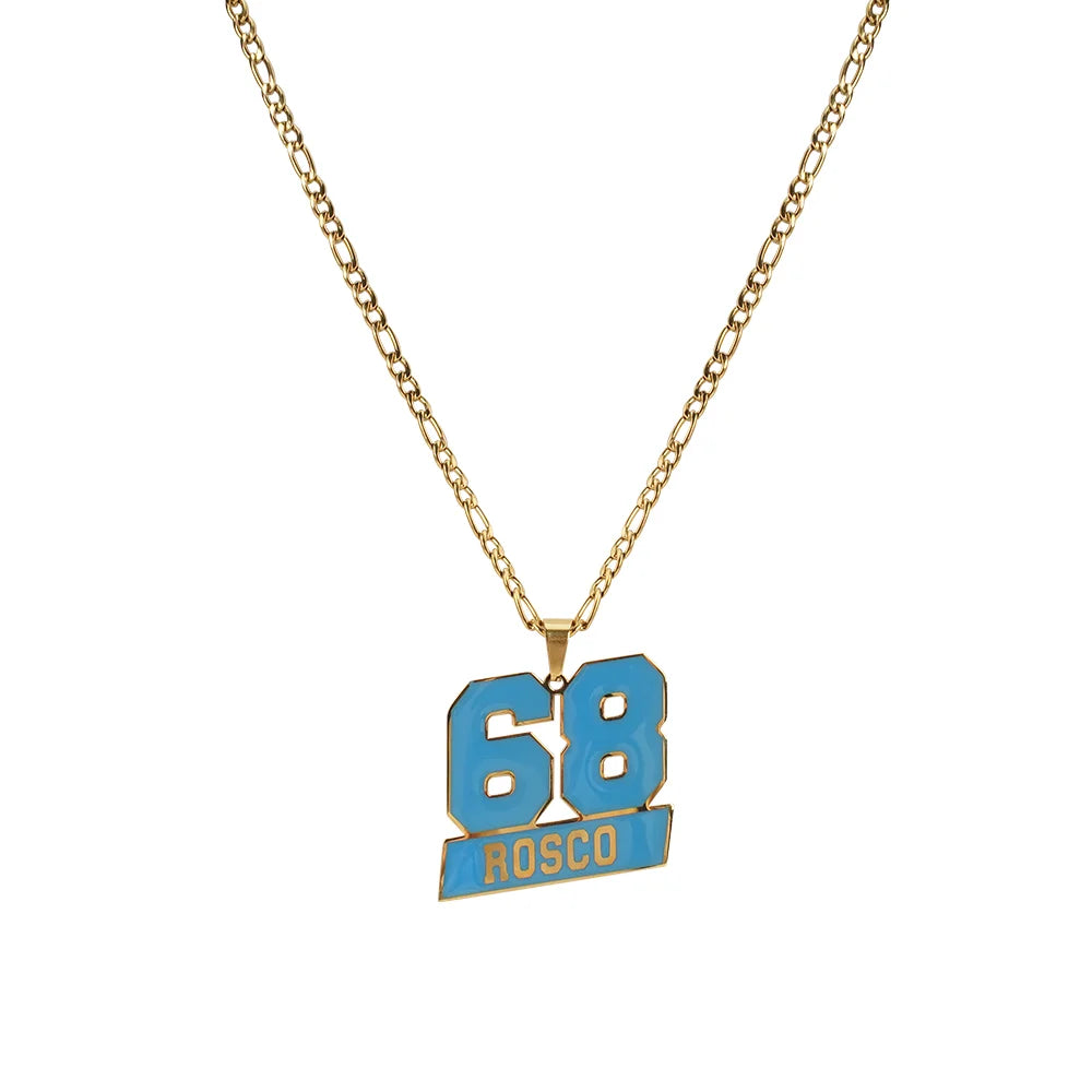 Gold necklace with a blue pendant featuring the number 68 and the name 'Rosco' on a white background.