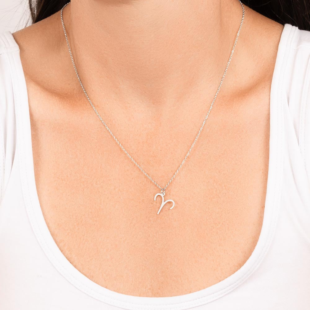A lady Wiring Zodiac Sign Necklace